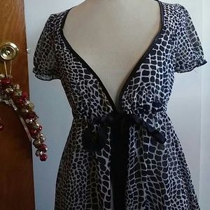Leopard print top. Open front with tie.